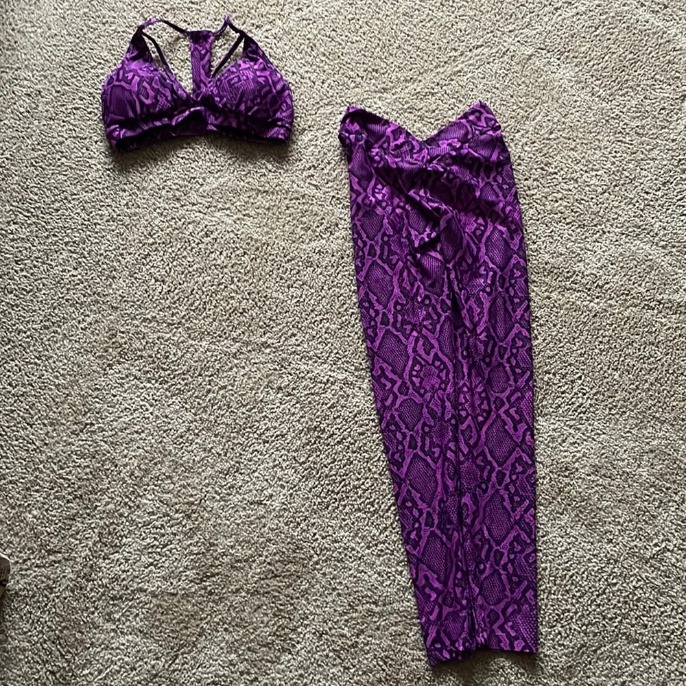 (Make a reasonable offer)Purple Lici Fit. Warn one time. Still like new.